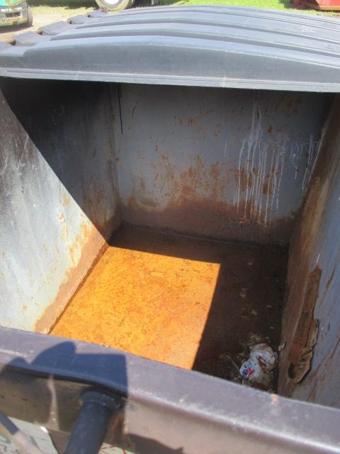 2 Yard steel end load dumpster, used w/ normal wear & tear