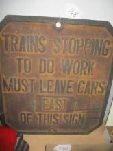 Cast Iron "Train Stopping To Do Work Must Leave Cars East of This Sign" 20" x 22"