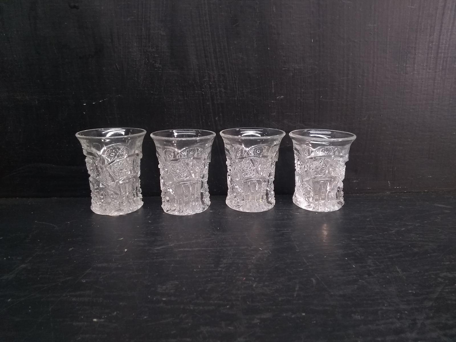 Collection of (4) Pressed Glass Shot Glasses