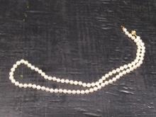 Pearl Necklace -clasp marked 14kt Gold