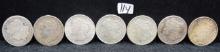 SEVEN MIXED DATE MORGAN DOLLARS