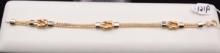 LADIES 14K TWO TONE FLEXIBLE LINK BRACELET