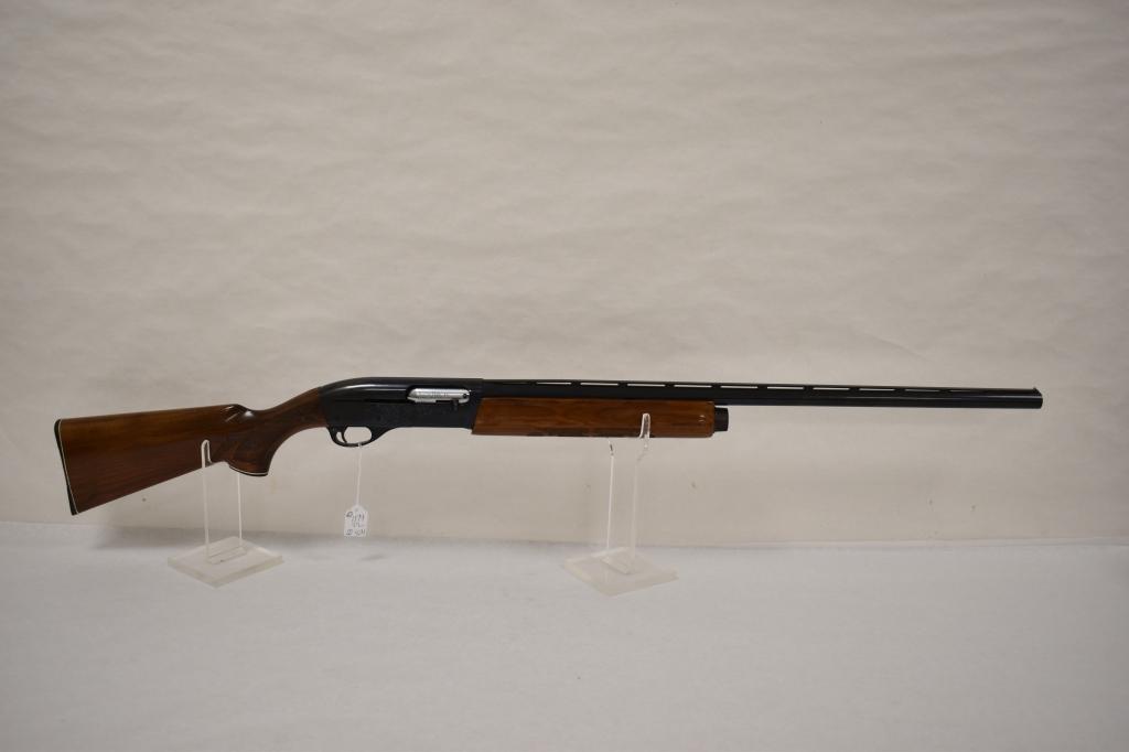 Gun. Remington Model 1100 12 ga Shotgun