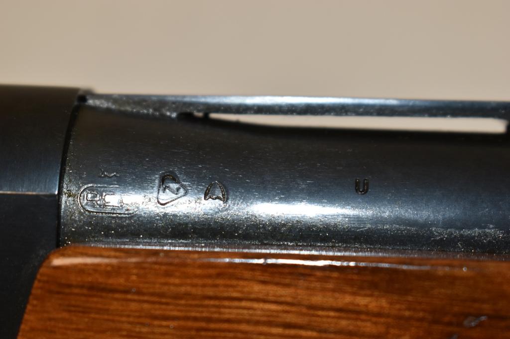 Gun. Remington Model 1100 12 ga Shotgun