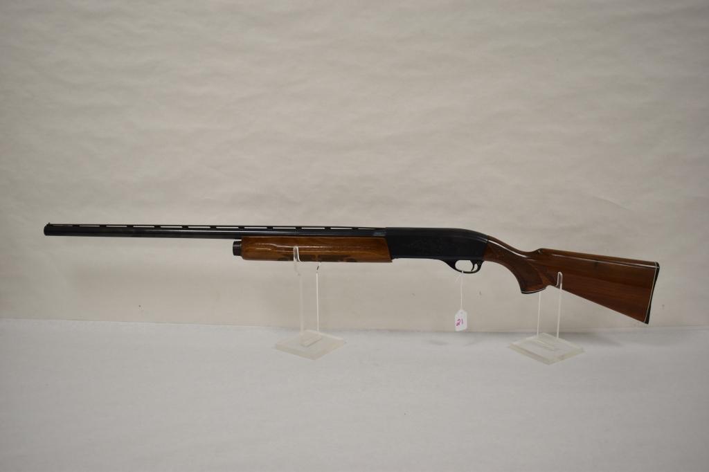 Gun. Remington Model 1100 12 ga Shotgun