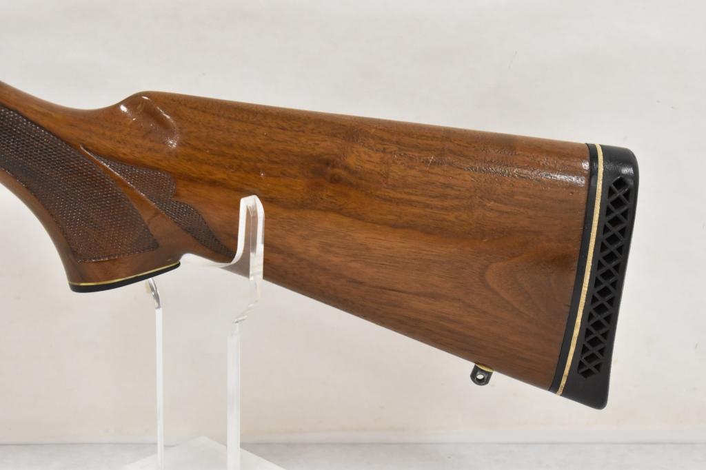 Gun. Remington Model 1100 12 ga Shotgun