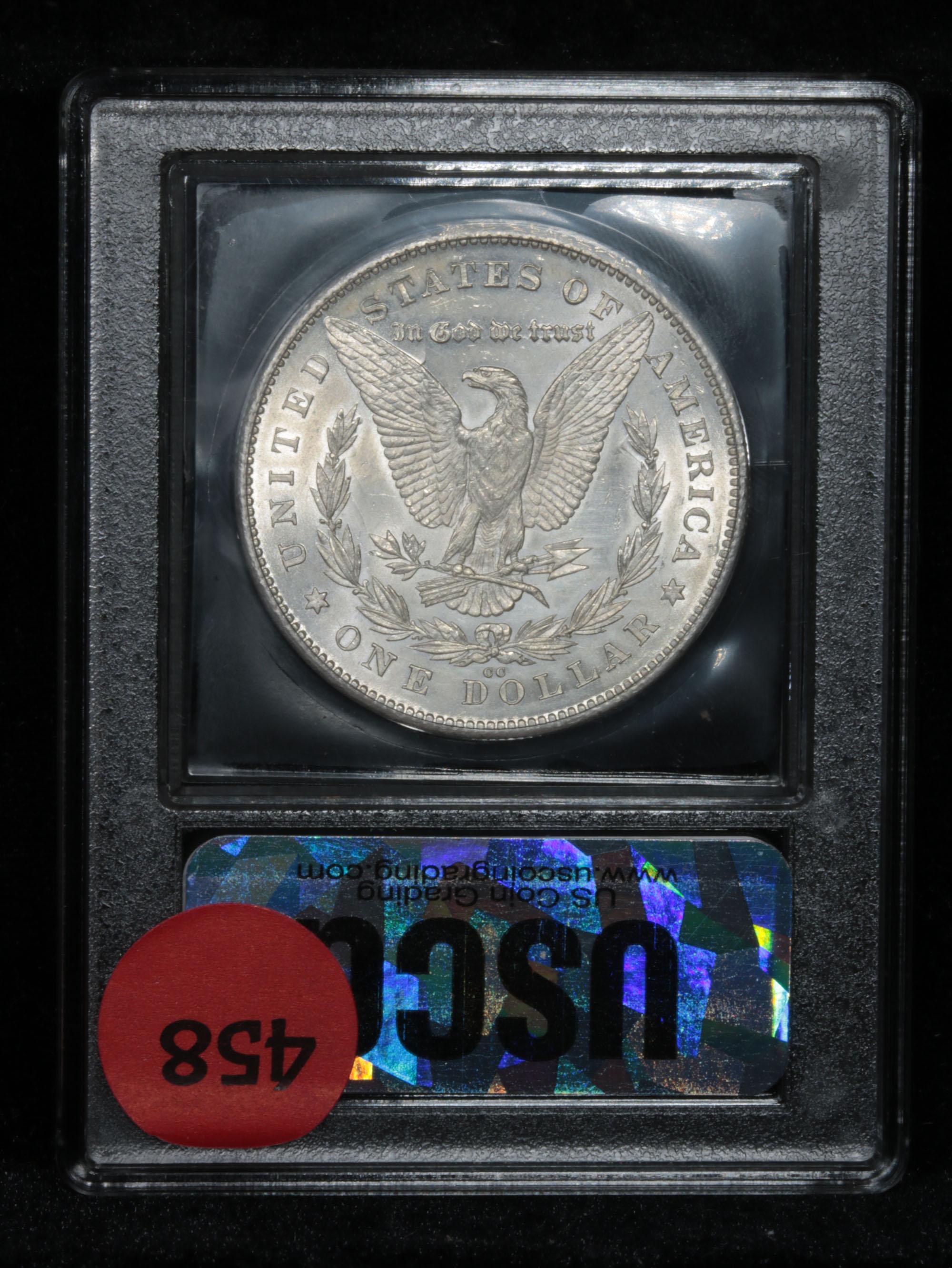 ***Auction Highlight*** 1880-cc Rev '78 Morgan Dollar $1 Graded GEM Unc by USCG (fc)