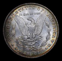 ***Auction Highlight*** 1885-p Rainbow Toned Morgan Dollar $1 Graded GEM+ Unc By USCG (fc)