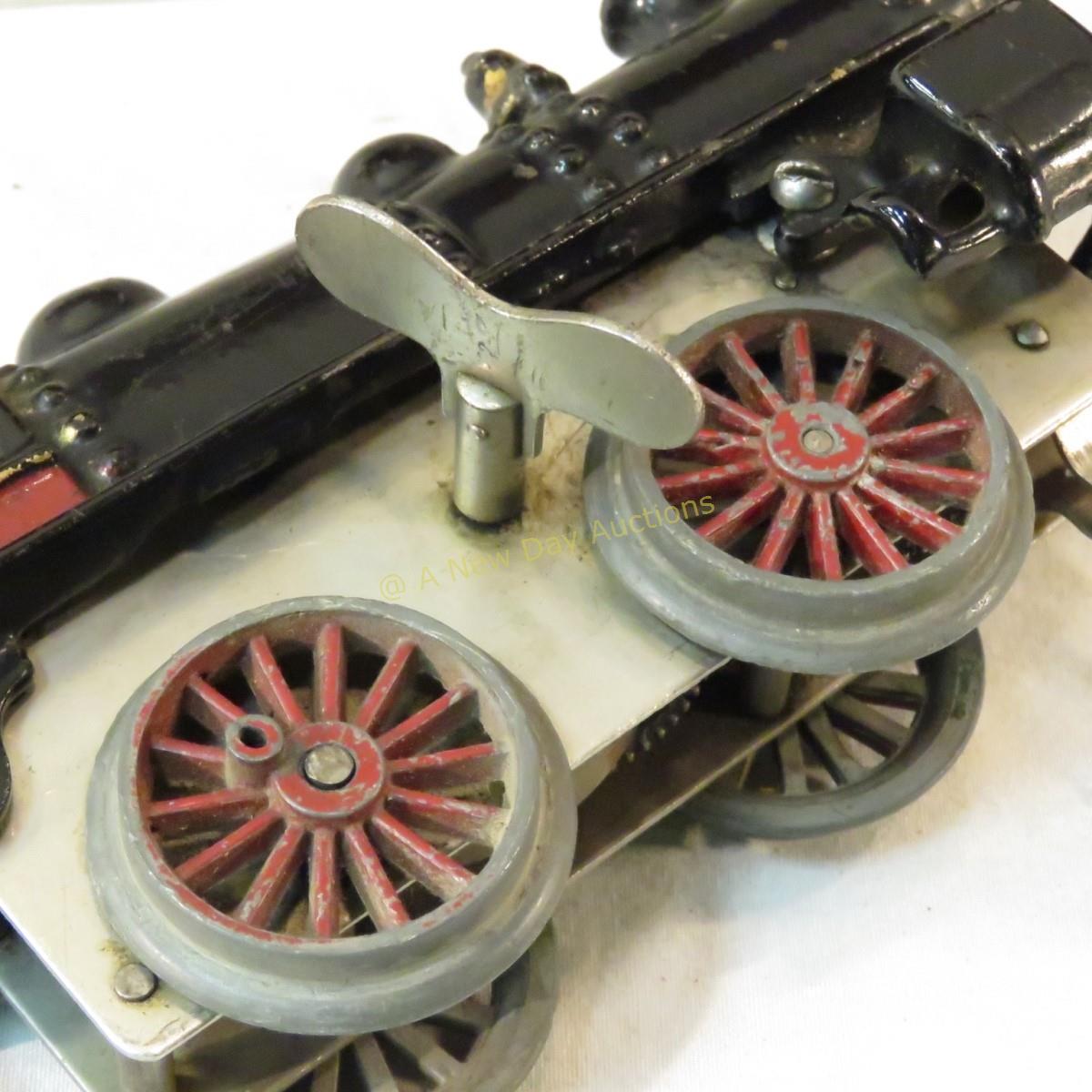 Pre-war Ives cast iron windup engine & 3 tin cars