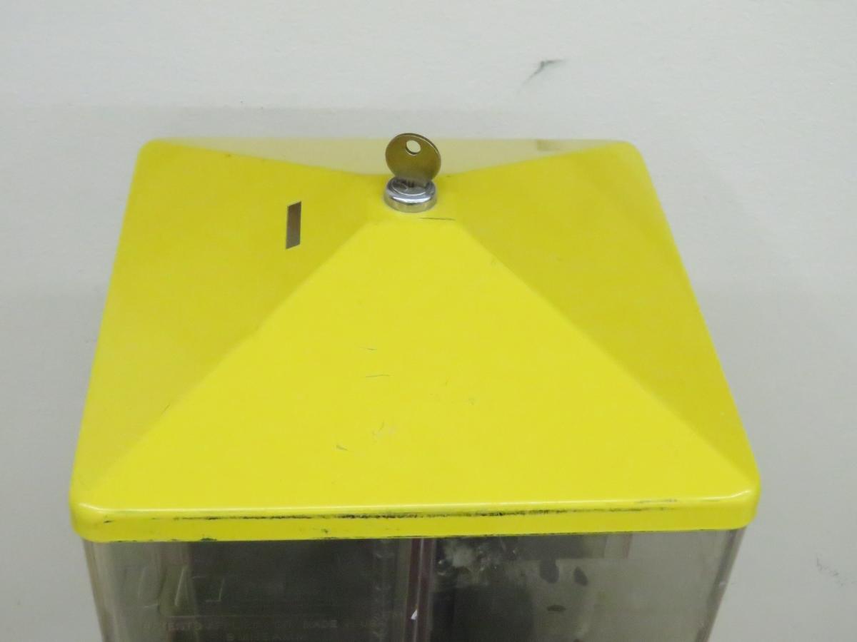 Vintage 4 sided candy dispenser machine with key