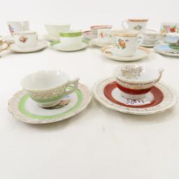 Antique demitasse cups, tea cups and saucers