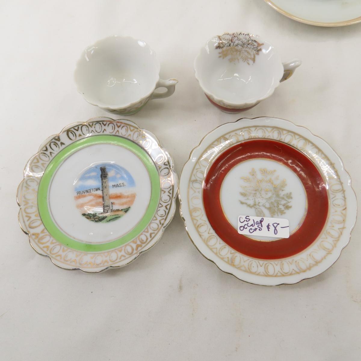 Antique demitasse cups, tea cups and saucers