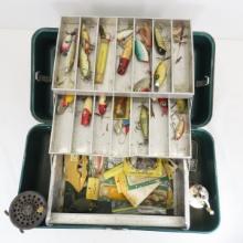 Vintage tackle box with lures and gear