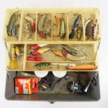 Vintage tackle box with lures and gear