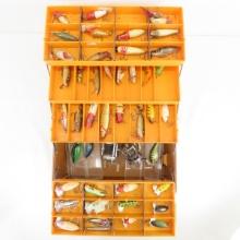 Vintage tackle box with lures and gear