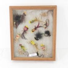 Vintage hand tied fishing flies in frame