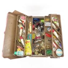 Vintage tackle box with lures and gear