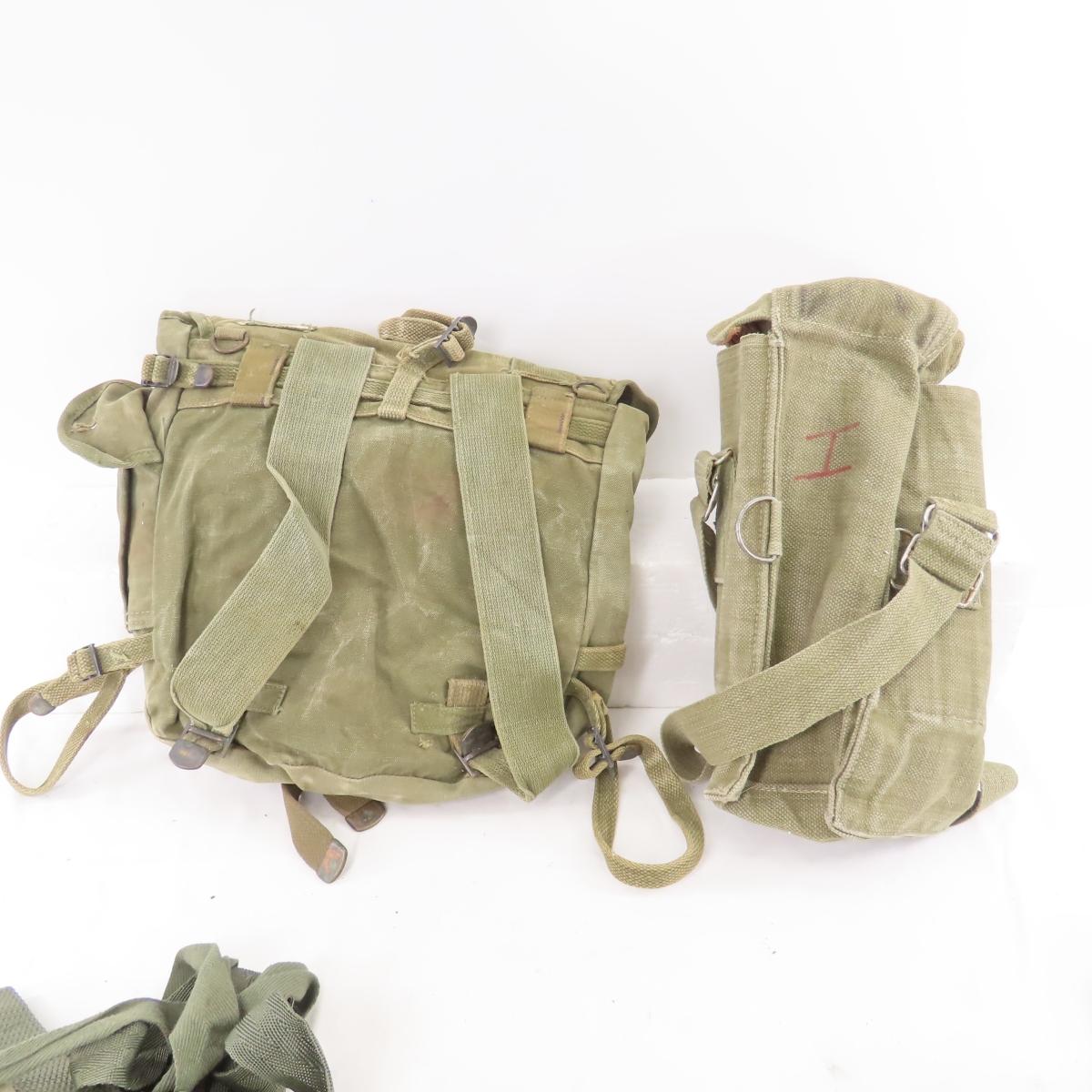 Bin full of mixed Military canvas, ammo pouches
