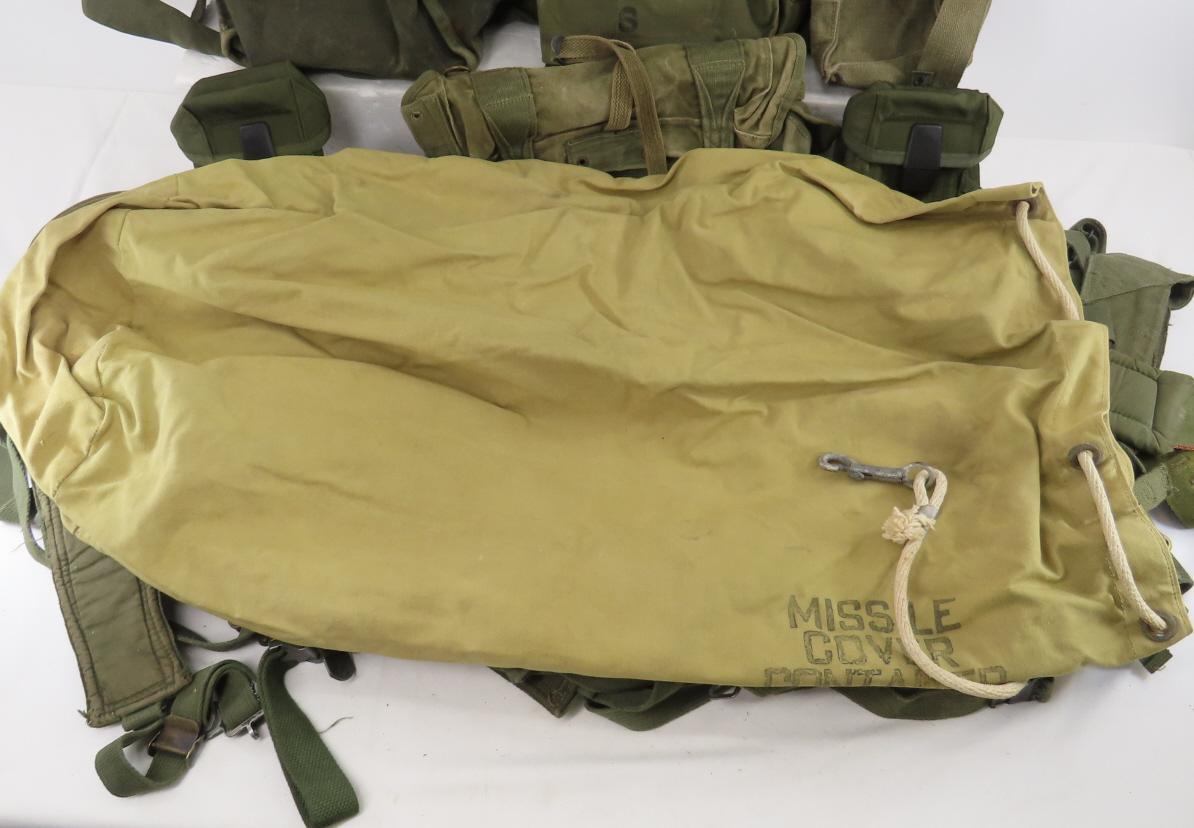 Bin full of mixed Military canvas, ammo pouches