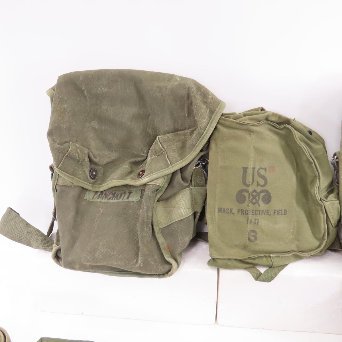 Bin full of mixed Military canvas, ammo pouches