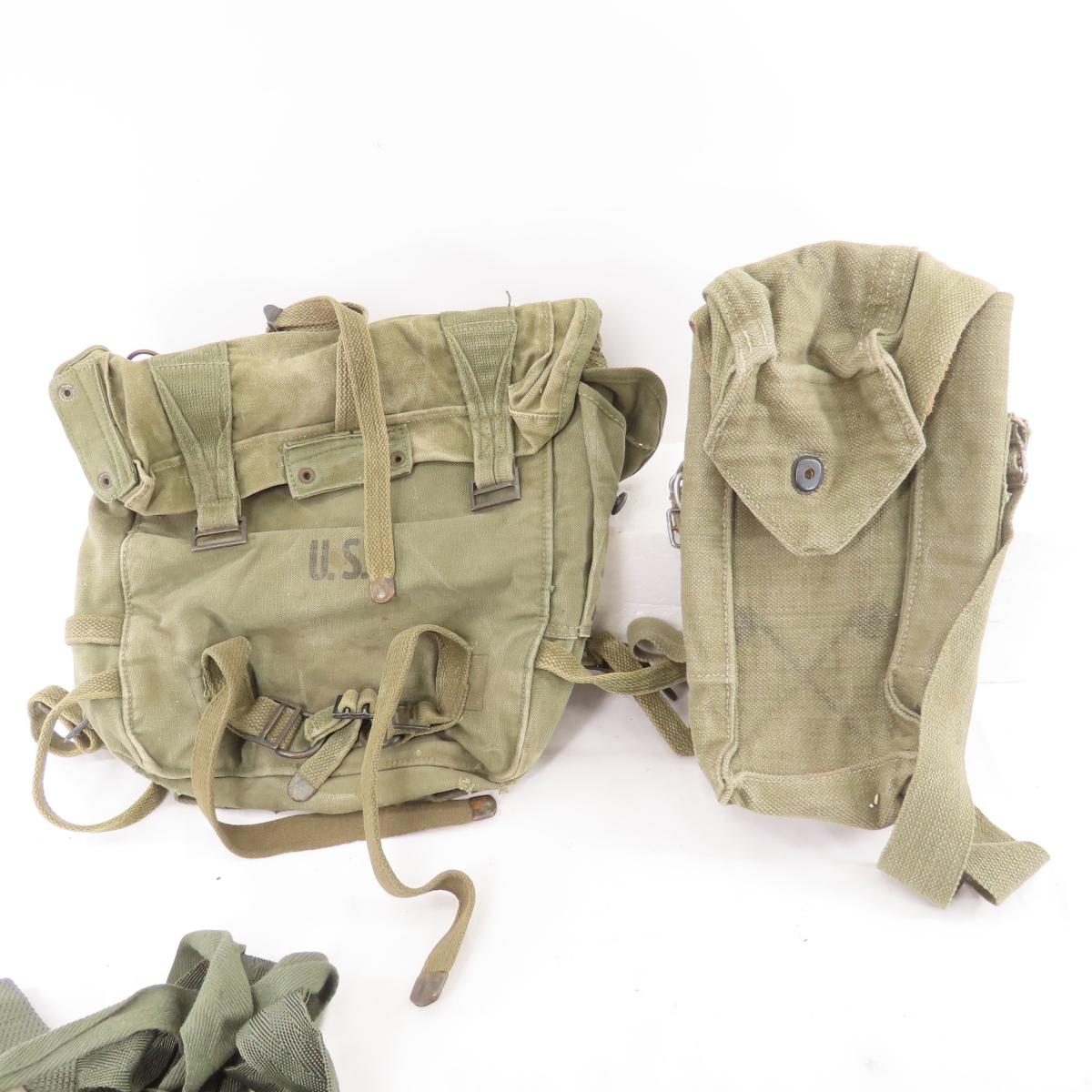 Bin full of mixed Military canvas, ammo pouches