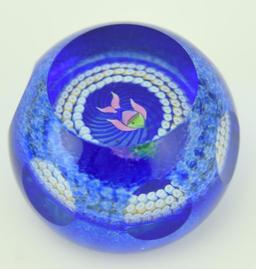 Lot 1247a - (4) Caithness signed art glass paperweights: one titled Starry Nights, and three