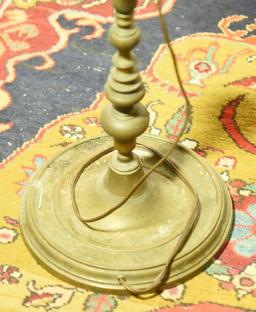 Lot 1364 - Brass and iron double floor lamp (63” in height)