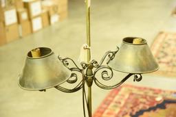 Lot 1364 - Brass and iron double floor lamp (63” in height)