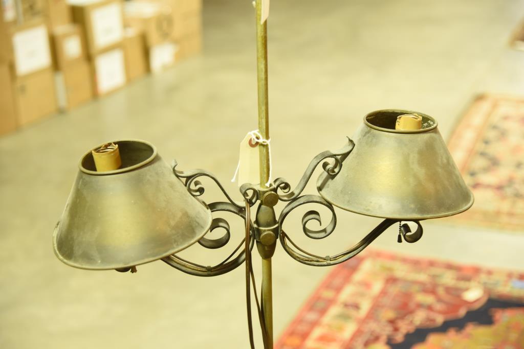 Lot 1364 - Brass and iron double floor lamp (63” in height)