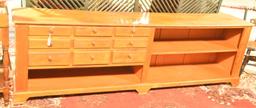 Lot 1379 - Antique pine 9 drawer apothecary cabinet with shelves (100” in width, 30 ½” in height,