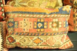 Lot 1389 - 5 pillows made from antique carpet & textiles: 3 made from rugs, another is done in