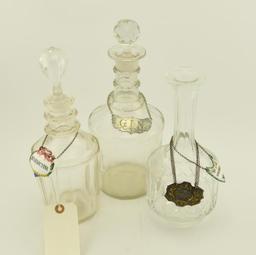 Lot 1489 - (3) Clear glass decanters: 2 are early and the other is cut crystal, comes with 2