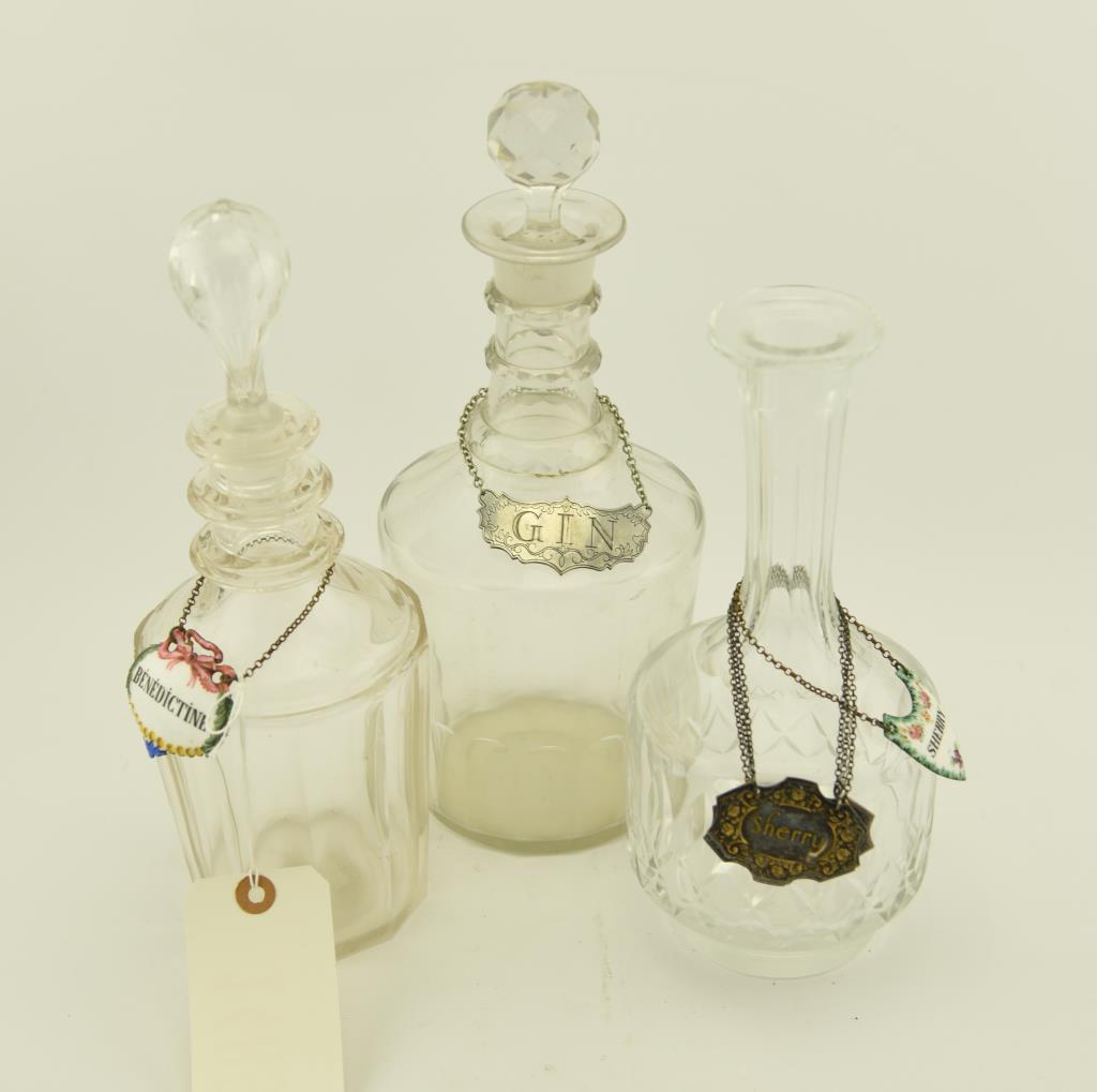 Lot 1489 - (3) Clear glass decanters: 2 are early and the other is cut crystal, comes with 2