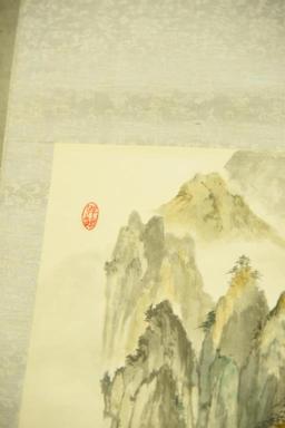 Lot 1556 - Oriental scroll with watercolor painting of mountain scene