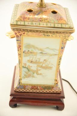Lot 1557 - Oriental Satsuma style old  painted porcelain lamp with wicker shade (27 ½” in height)