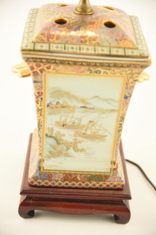 Lot 1557 - Oriental Satsuma style old  painted porcelain lamp with wicker shade (27 ½” in height)