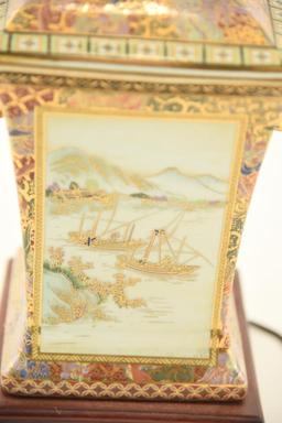 Lot 1557 - Oriental Satsuma style old  painted porcelain lamp with wicker shade (27 ½” in height)