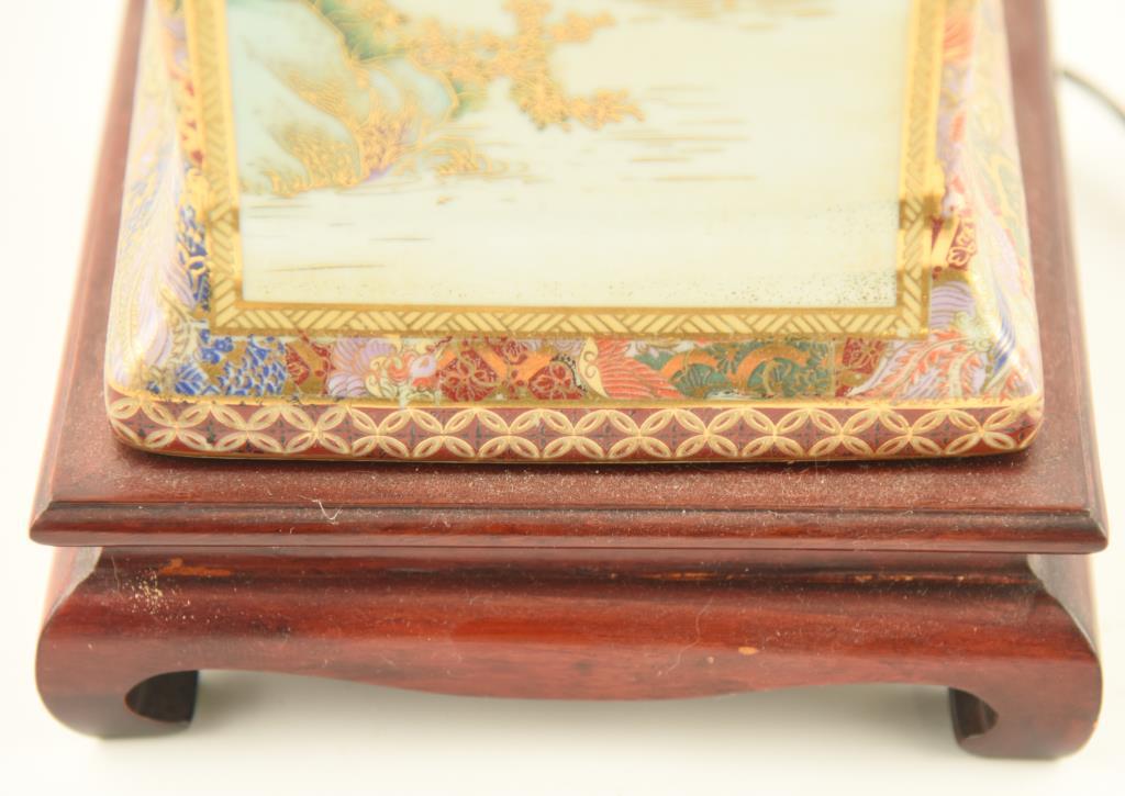 Lot 1557 - Oriental Satsuma style old  painted porcelain lamp with wicker shade (27 ½” in height)