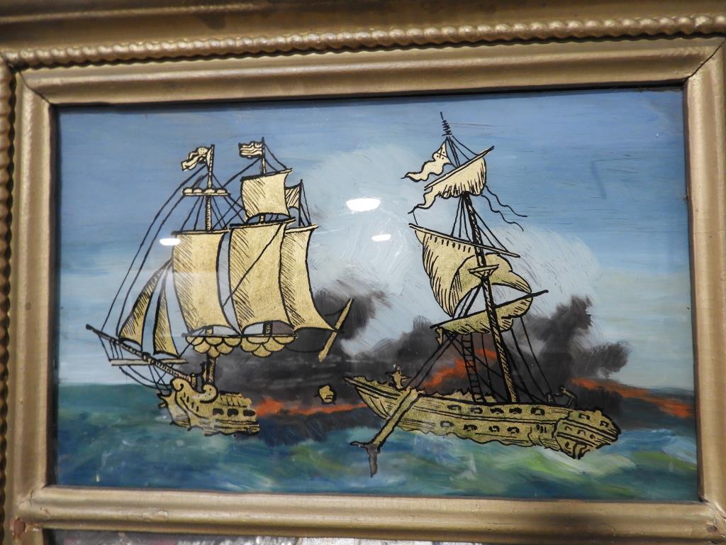 Lot 1719 - Antique mirror with eglomise panel in top depicting a battle at sea between 2 ships