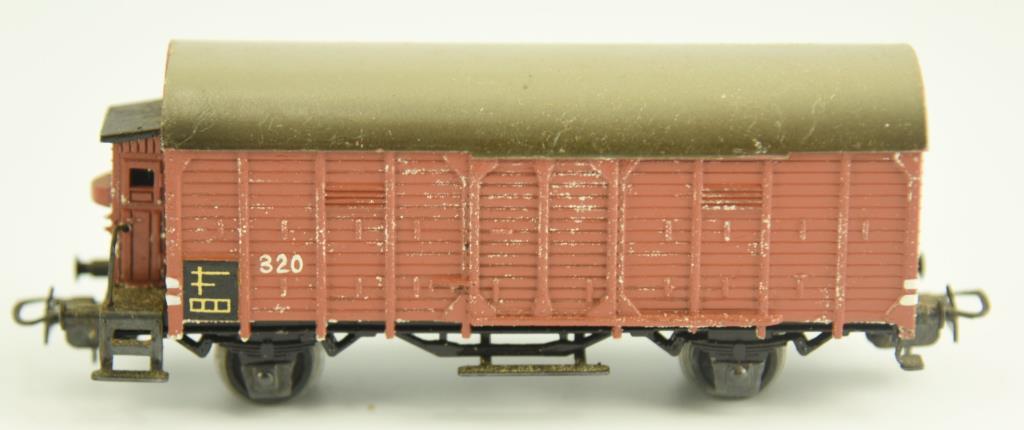 Lot #17 - (8) Vintage Marklin train cars: Model 310 Baggage Car, (4) Boxcars, model 321 G Stake