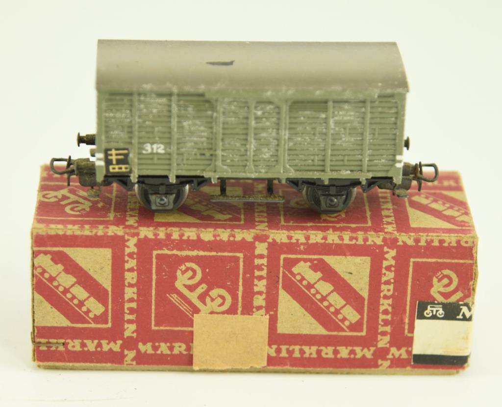 Lot #17 - (8) Vintage Marklin train cars: Model 310 Baggage Car, (4) Boxcars, model 321 G Stake