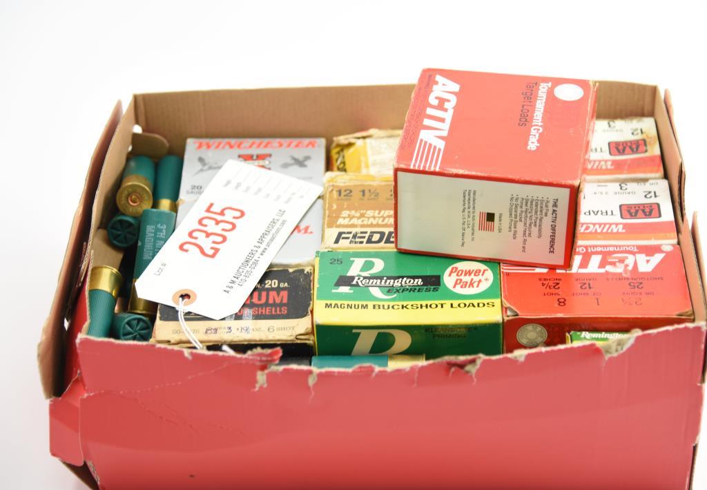 Lot #2335 - Large lot of mixed shotgun ammo: (7) boxes of mixed 12 gauge trap loads, (3) boxes of
