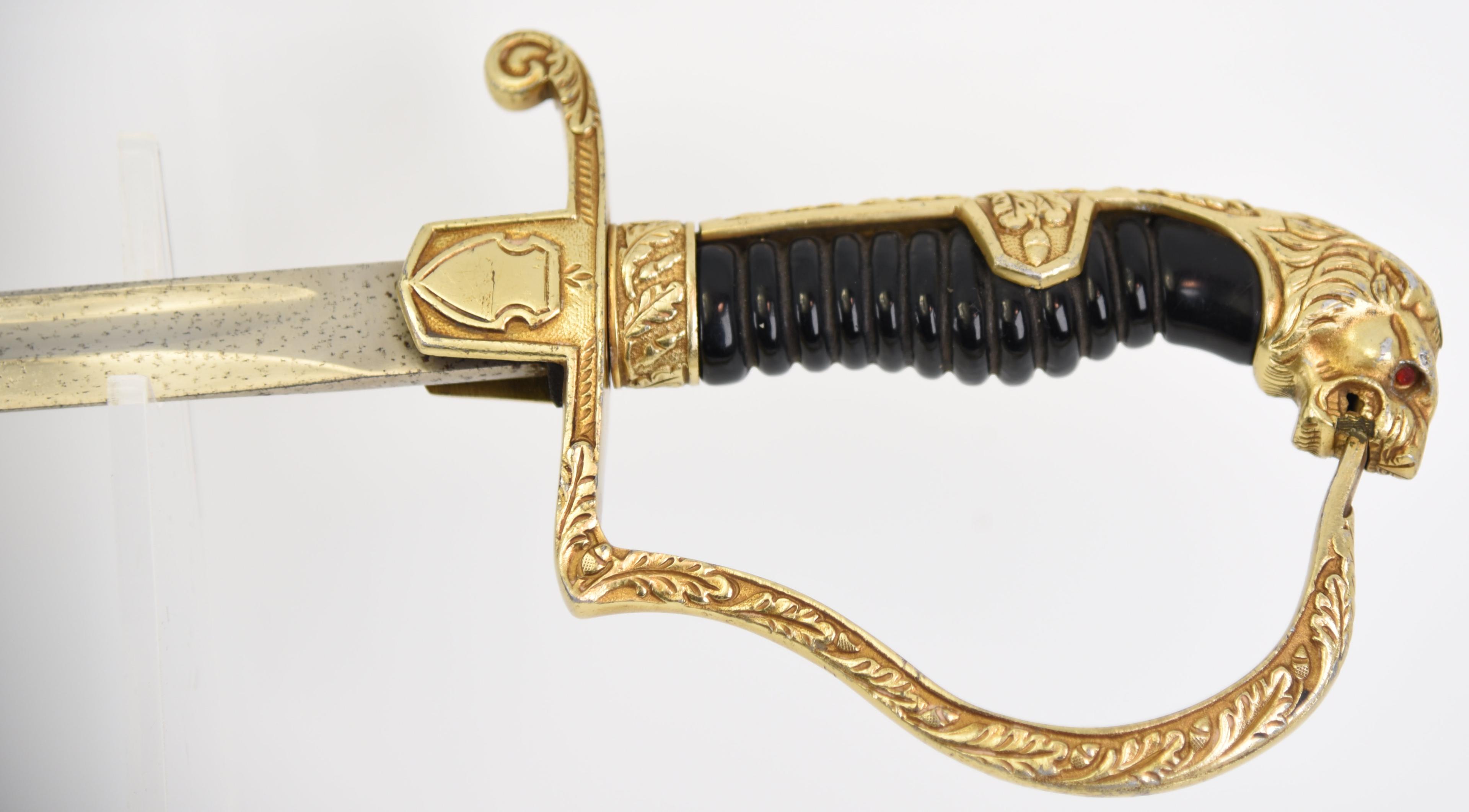 Lot #2687a - German WWII Army lion-head saber with Wehrmacht-style eagle and Swastika