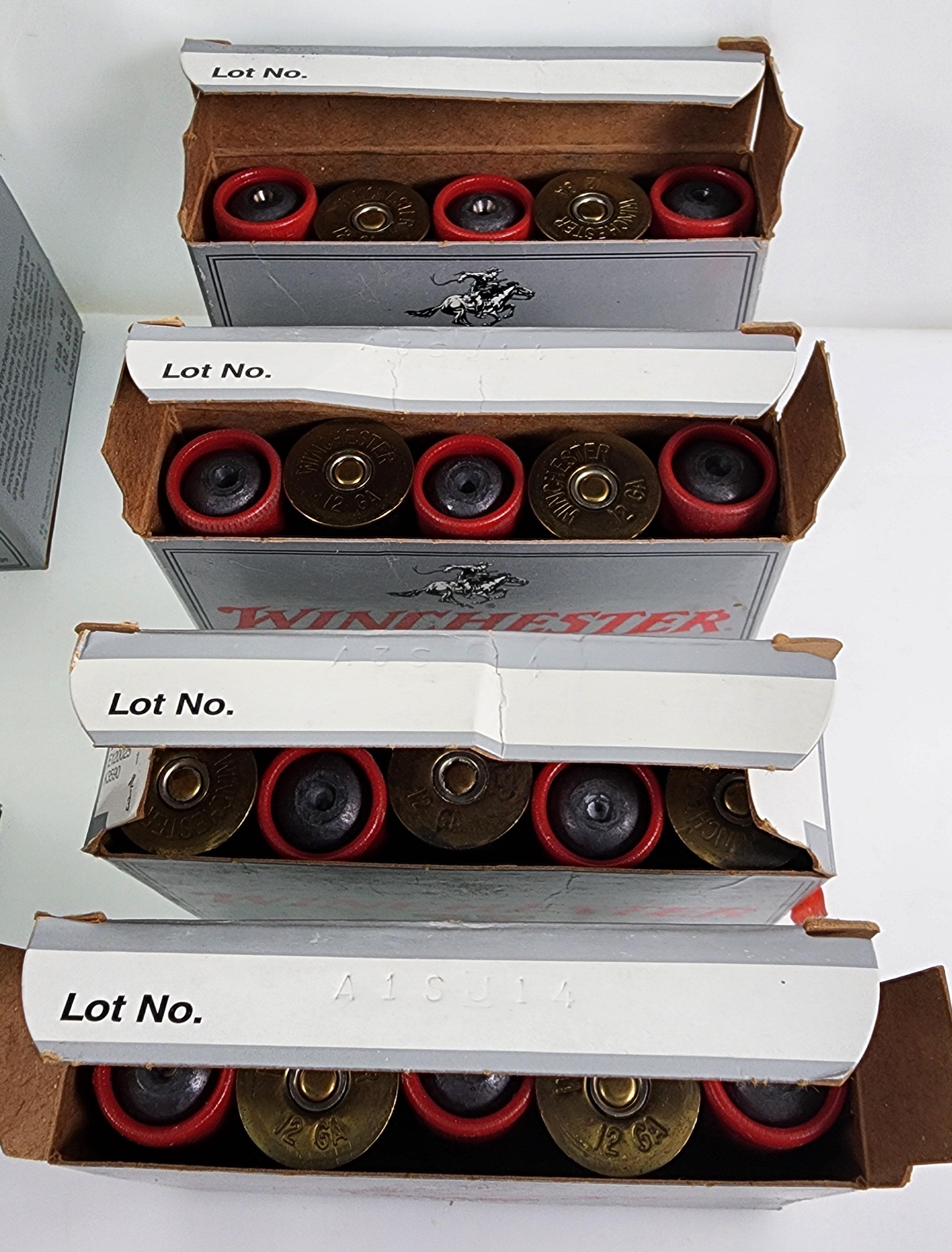 46 +/- Winchester 12 GA Rifled 1 Oz 2.75" lead  slugs. Four Boxes of 5 Each. One Box of 15