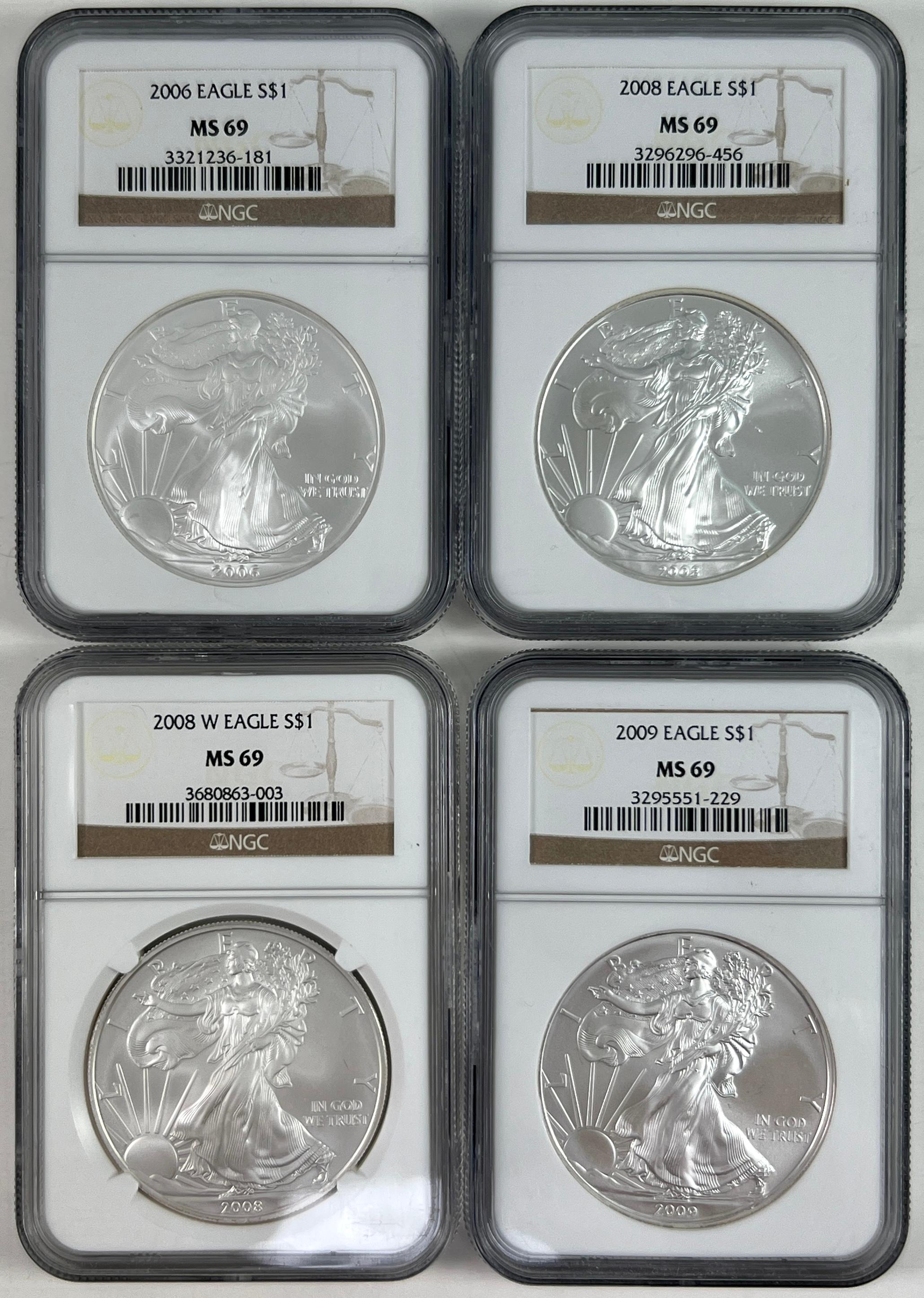Lot of 4 certified U.S. American Eagle silver dollars