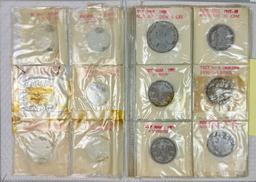 Lot of 2 albums of 23 1940s-1960s Vietnam (Annam) coins