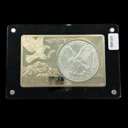 2021 type 2 uncirculated U.S. American Eagle silver dollar in a 35th anniversary white metal ingot