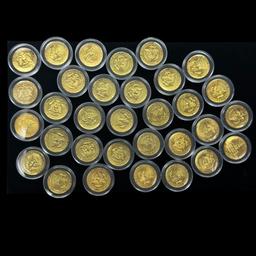 Lot of 32 different uncirculated gold-accented U.S. Kennedy half dollars