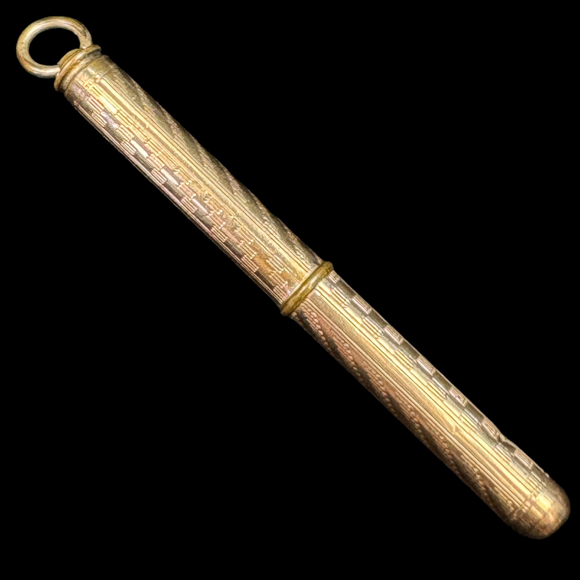 Antique retractable yellow gold-filled toothpick