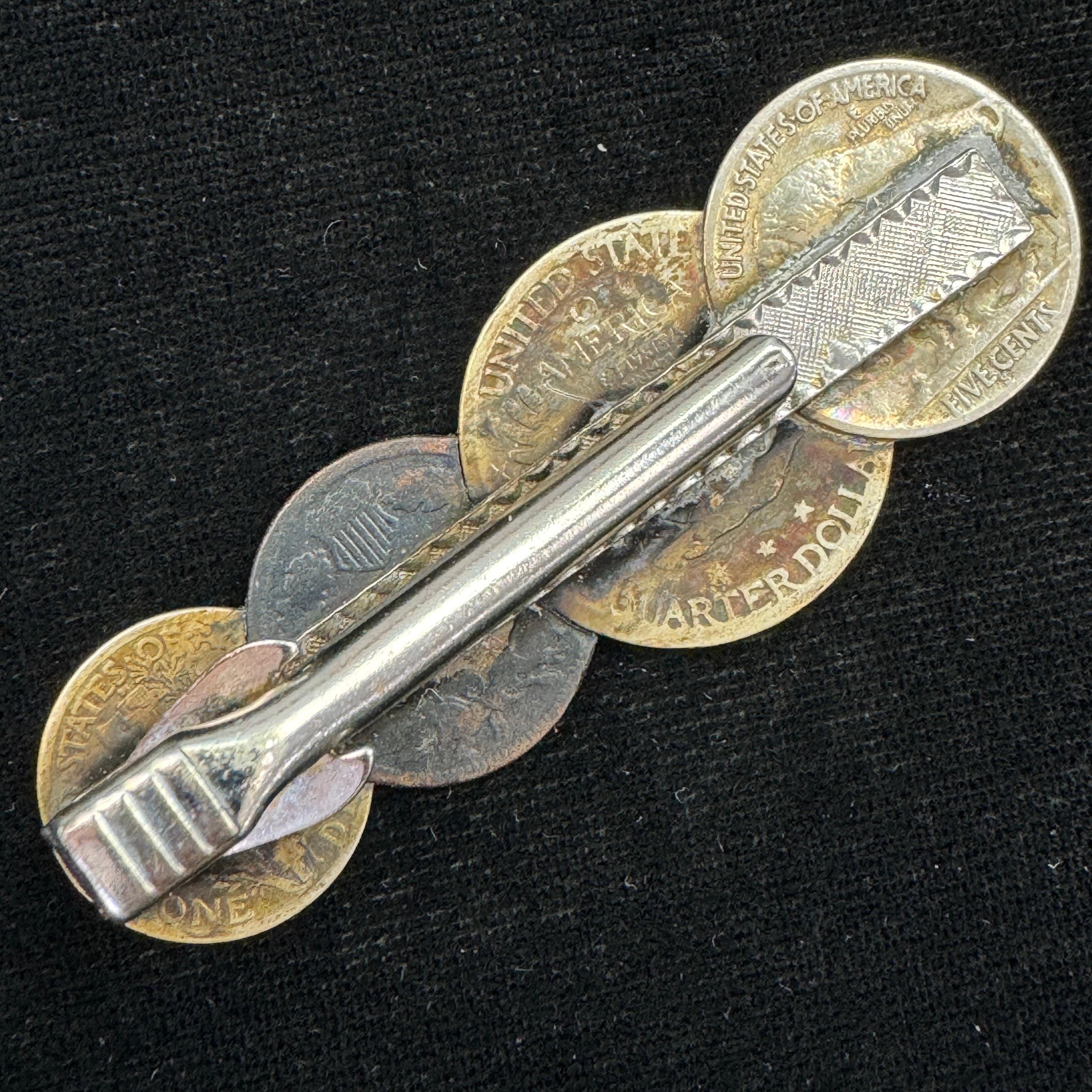 Vintage tie clasp with Indian cent, buffalo nickel, Mercury dime & standing Liberty quarter